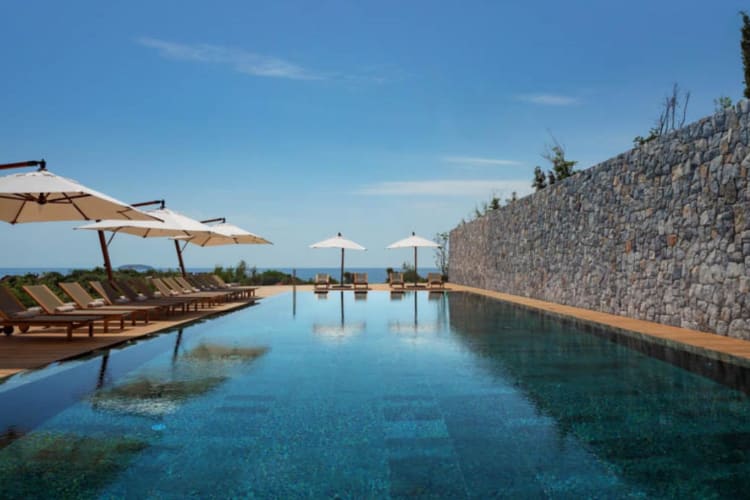 Outdoor pool and sunbeds
